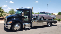 Freeway Towing & Storage Towing Classic Chevrolet on flatbed tow truck in Mesa, Az.