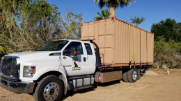 Freeway Towing & Storage Towing 20' shipping container in Phoenix, Az